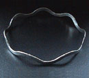 Wave design hallmarked sterling silver bangle